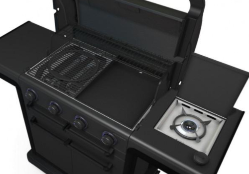 Barbecue Onyx noir avec grille, plaque et brûleurs pour la cuisson.